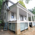 andrew watkins custom home building design build hot springs virginia perma cast column tigerwood porch floor englert metal roof