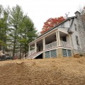 andrew watkins custom home building design build exterior stairs hot springs virginia tigerwood historic porch balusters handrail primed fir