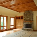 custom home, interior, fireplace, stone, eagle window, cherry cabinet, stained pine trim
